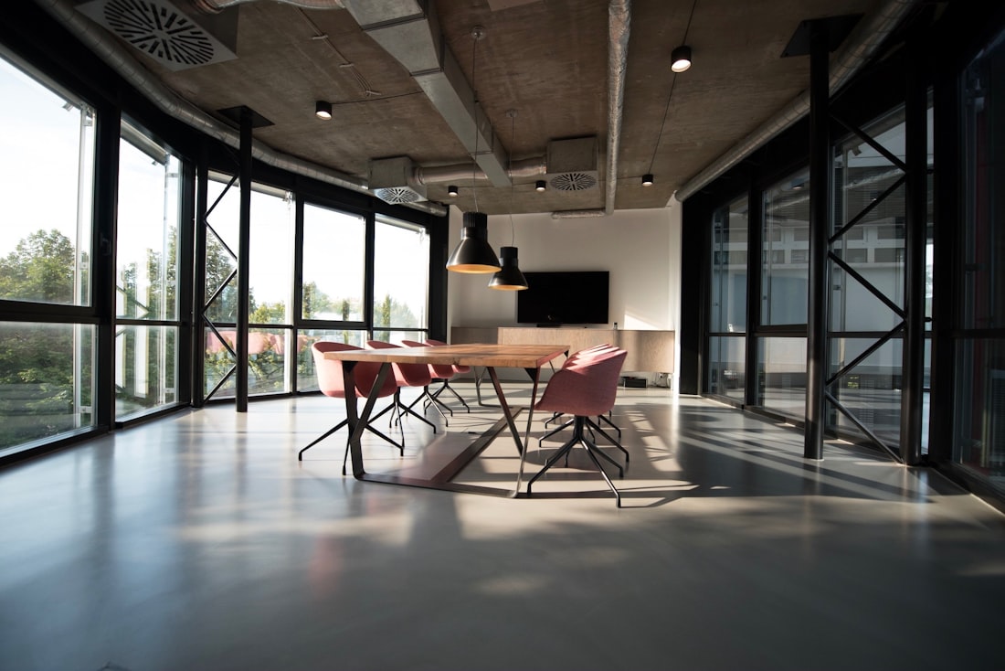 An empty meeting room with glass walls