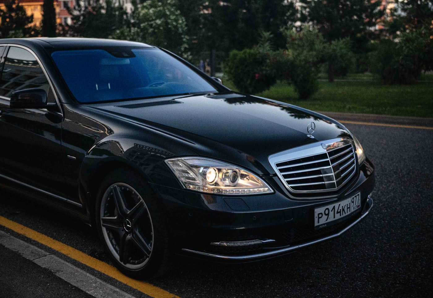 An executive sedan on a city route